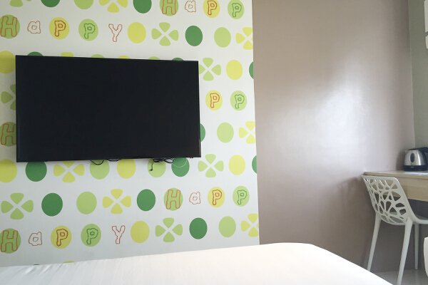 Each room is equipped with a HUGE TV and a study area.