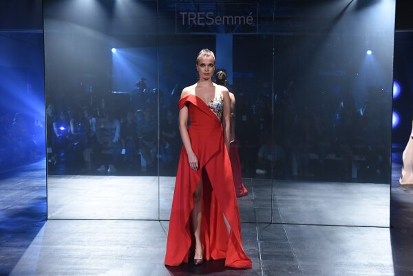 Mark Bumgarner interprets modern elegance in red and nude softly structured ensembles with his signature feminine touch.