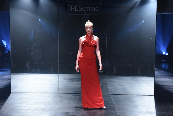 Mark Bumgarner interprets modern elegance in red and nude softly structured ensembles with his signature feminine touch.