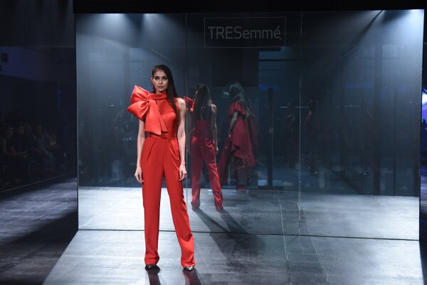 Mark Bumgarner interprets modern elegance in red and nude softly structured ensembles with his signature feminine touch.