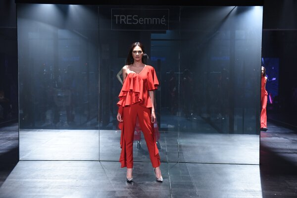 Mark Bumgarner interprets modern elegance in red and nude softly structured ensembles with his signature feminine touch.