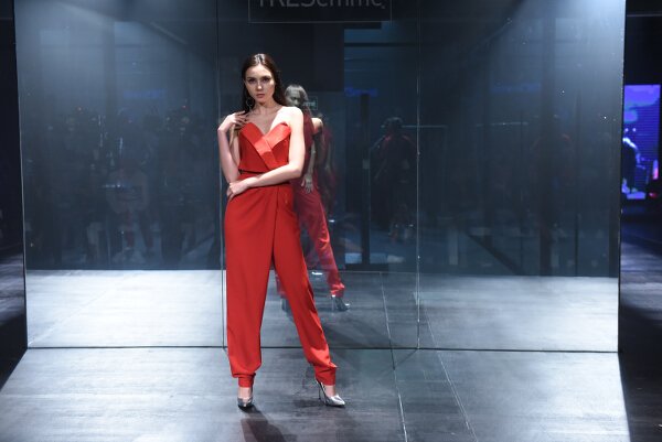 Mark Bumgarner interprets modern elegance in red and nude softly structured ensembles with his signature feminine touch.
