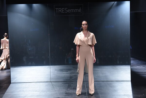 Mark Bumgarner interprets modern elegance in red and nude softly structured ensembles with his signature feminine touch.