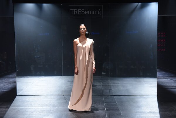 Mark Bumgarner interprets modern elegance in red and nude softly structured ensembles with his signature feminine touch.