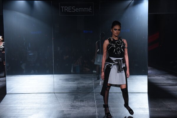 Jerome Lorico creates stunning textured metallic ensembles in a futuristic palette of silver, platinum, and black.