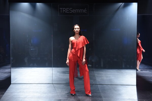 Mark Bumgarner interprets modern elegance in red and nude softly structured ensembles with his signature feminine touch.