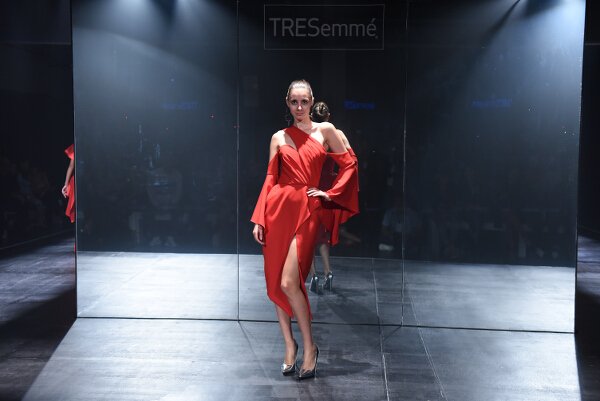 Mark Bumgarner interprets modern elegance in red and nude softly structured ensembles with his signature feminine touch.
